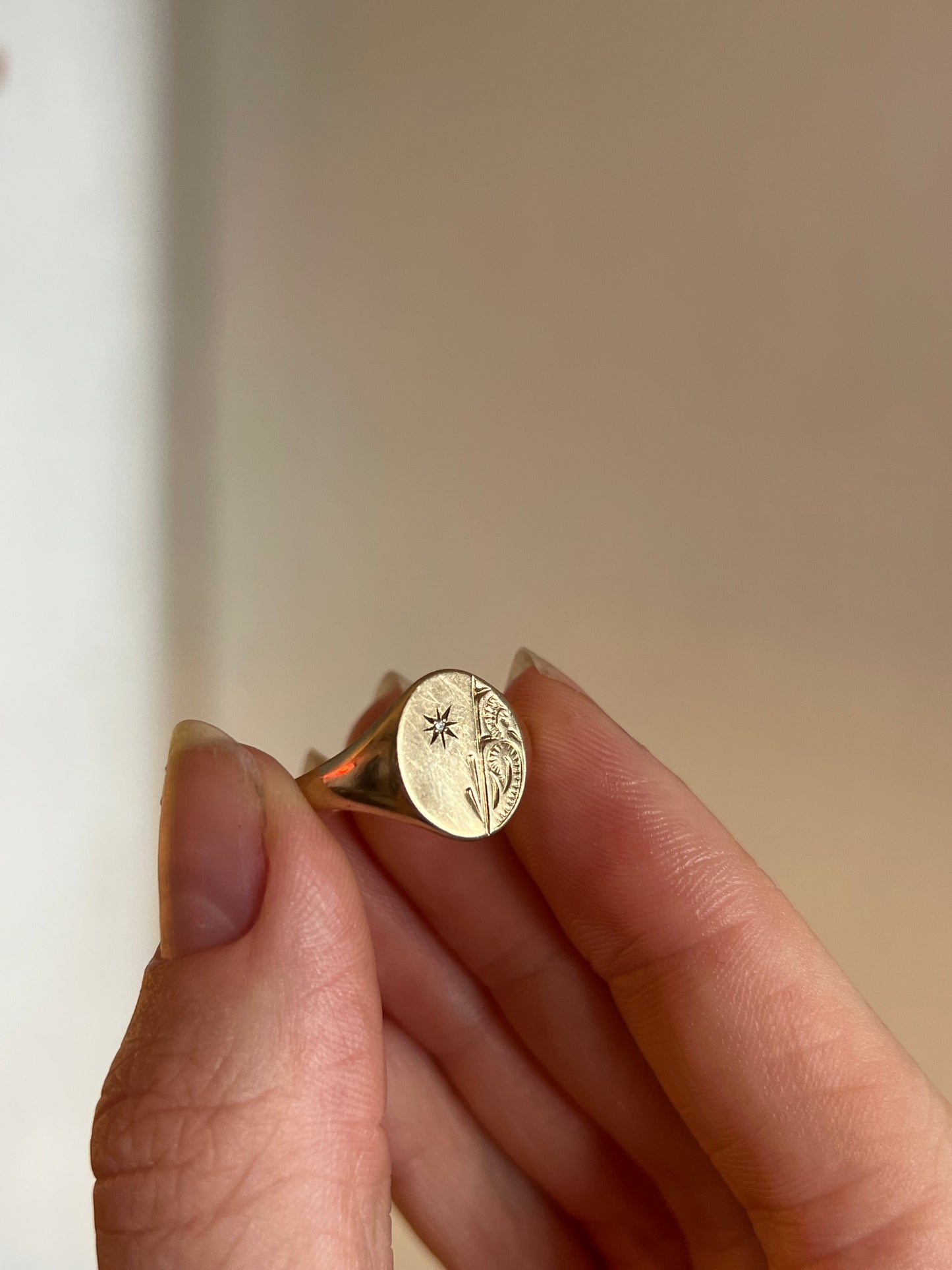 Engraved signet ring with diamond