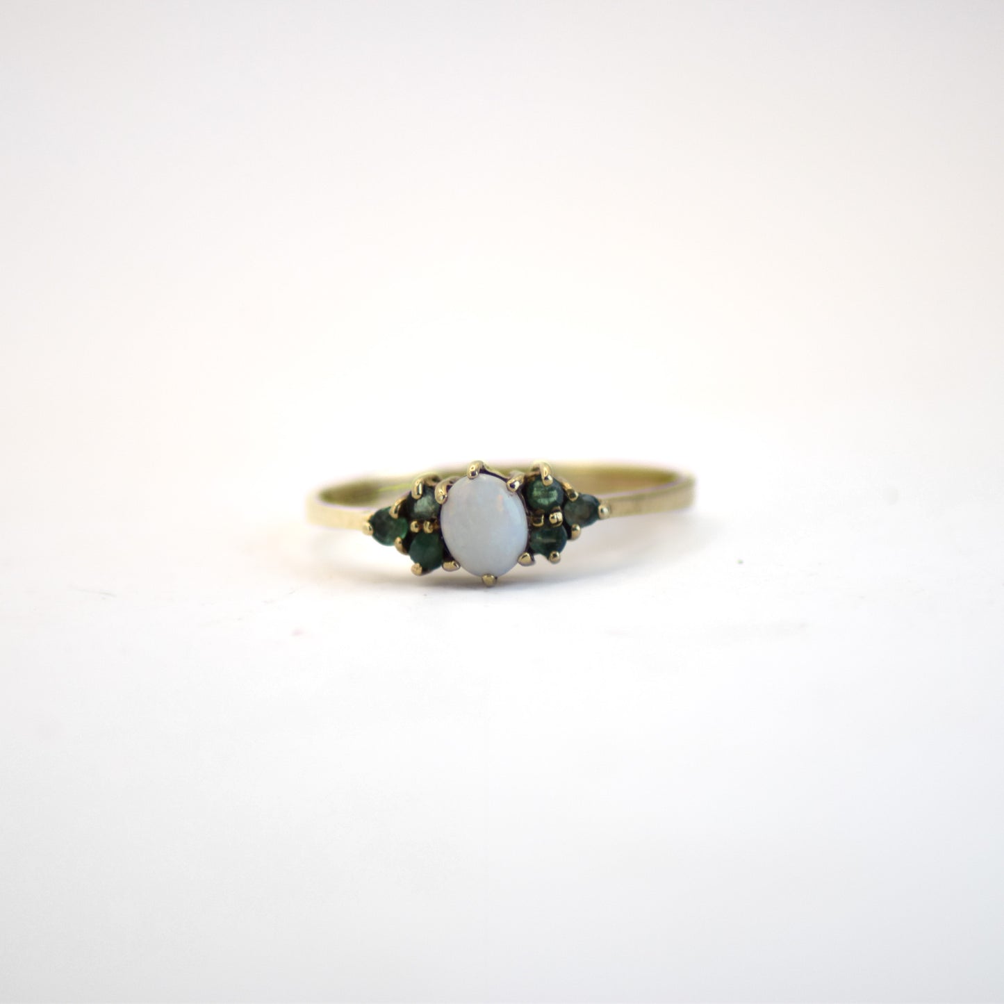 Opal and emerald 9ct gold ring