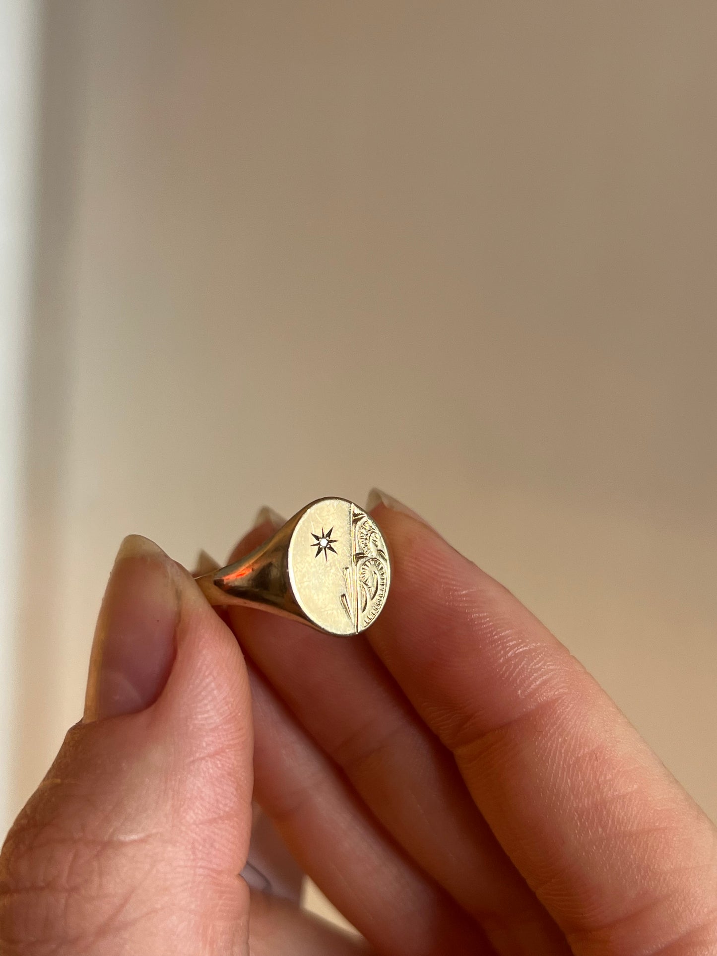 Engraved signet ring with diamond
