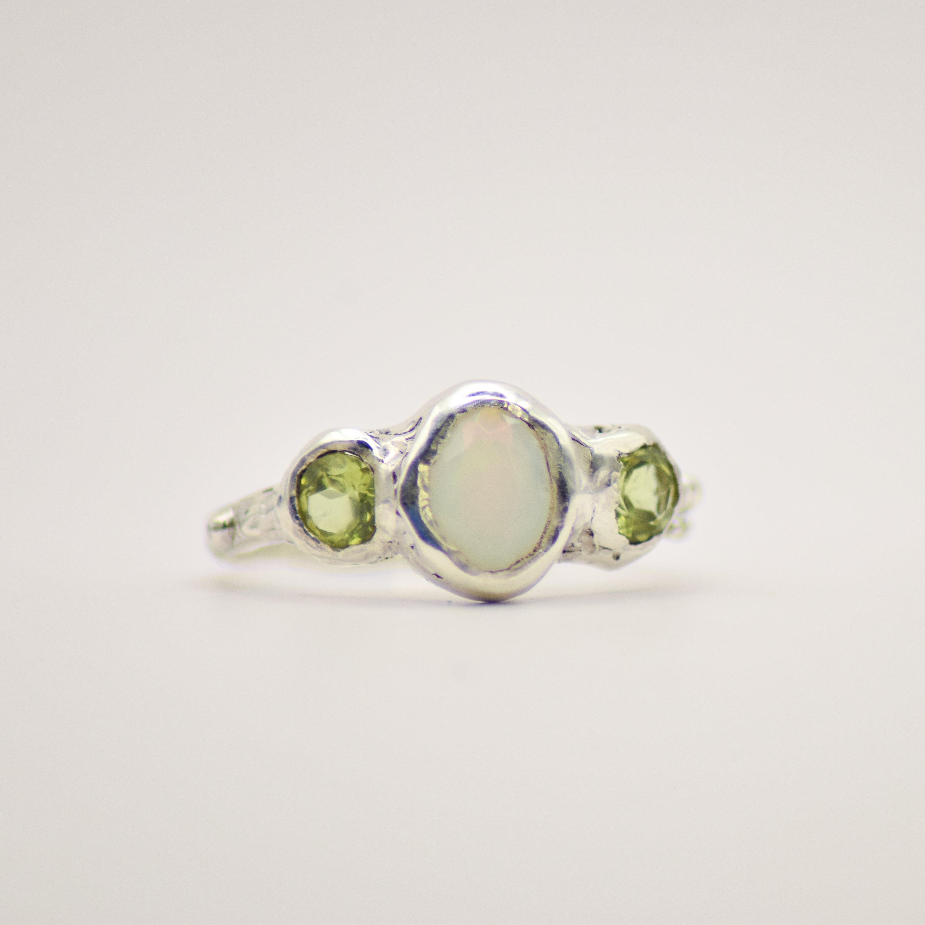 Opal and peridot ring