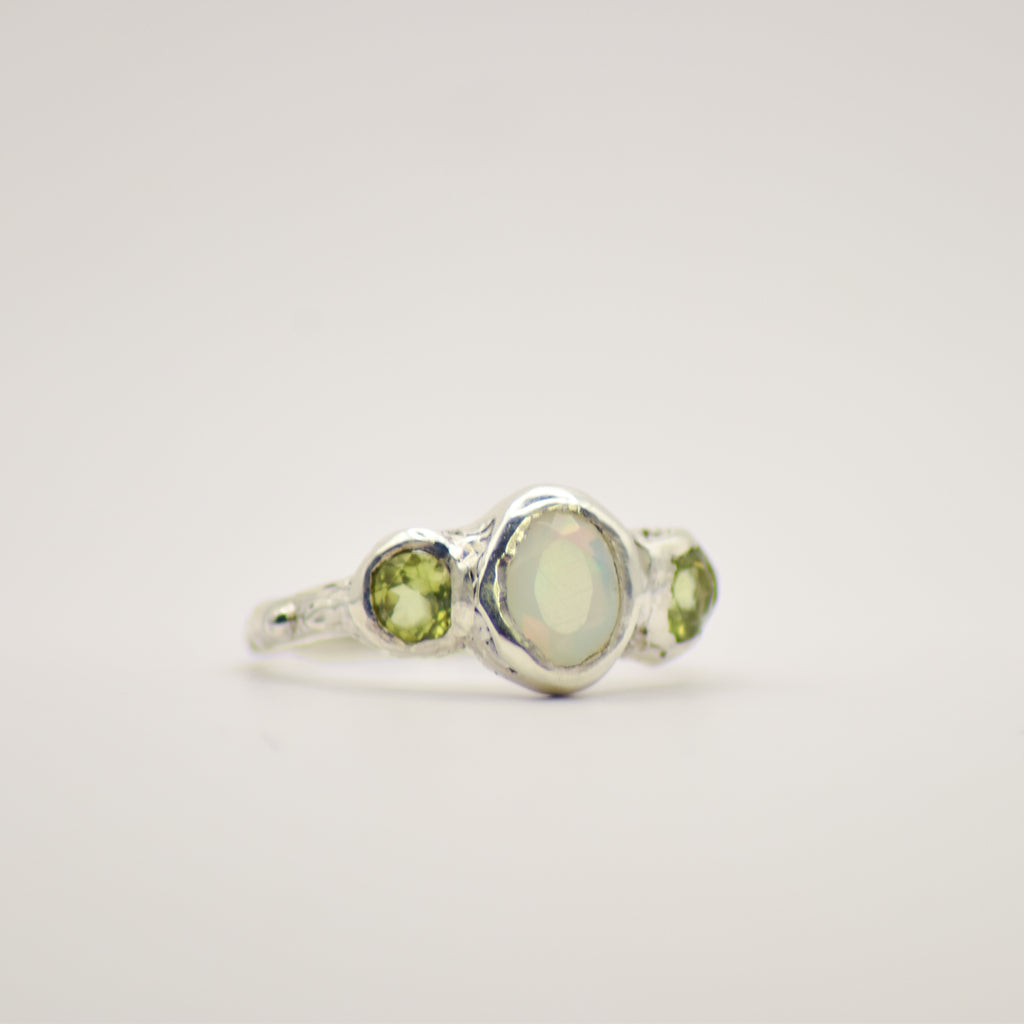 Opal and peridot ring