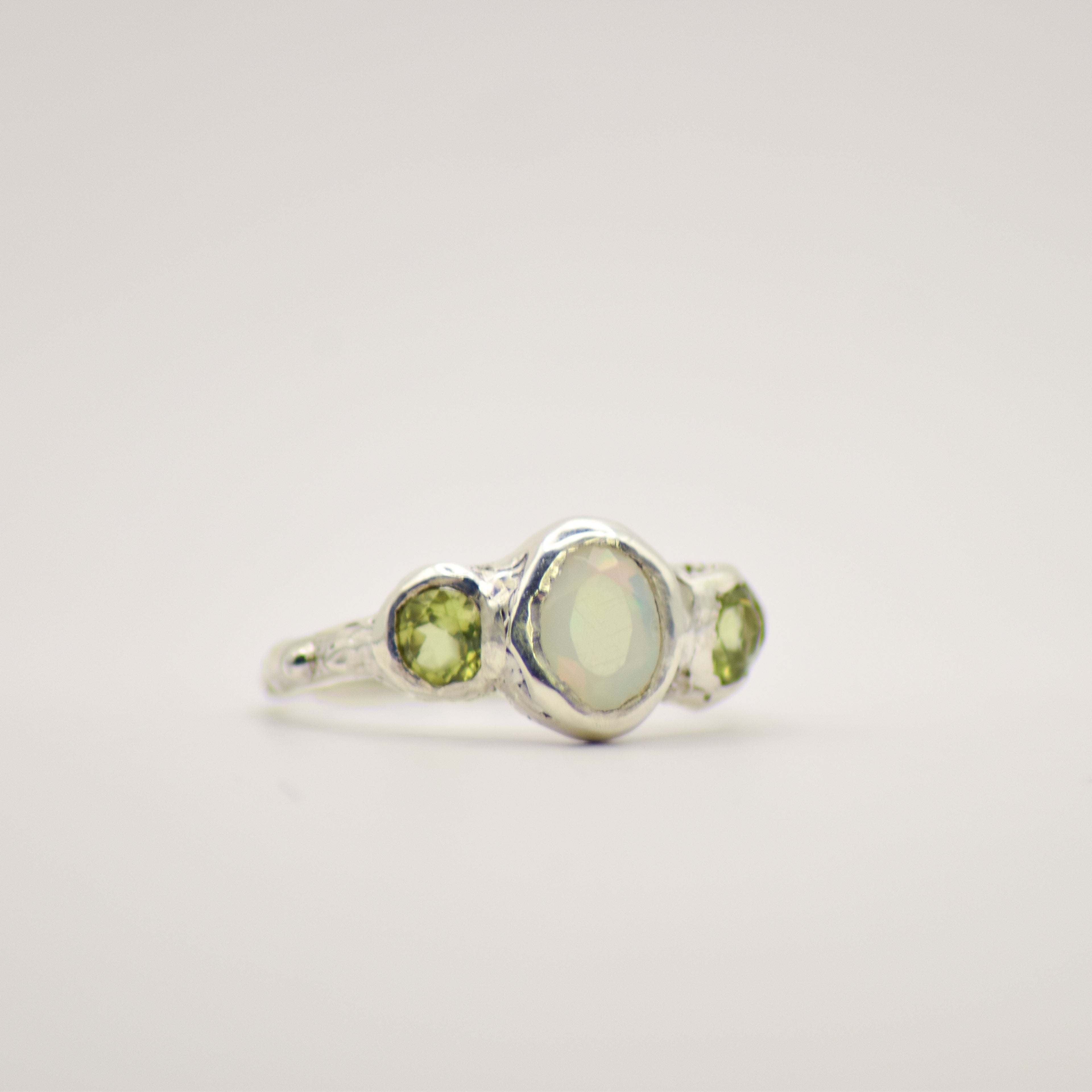 Opal and peridot ring