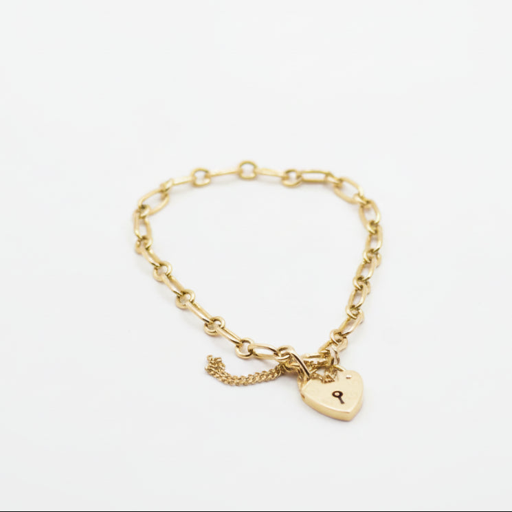 Heart lock figaro bracelet 9ct gold