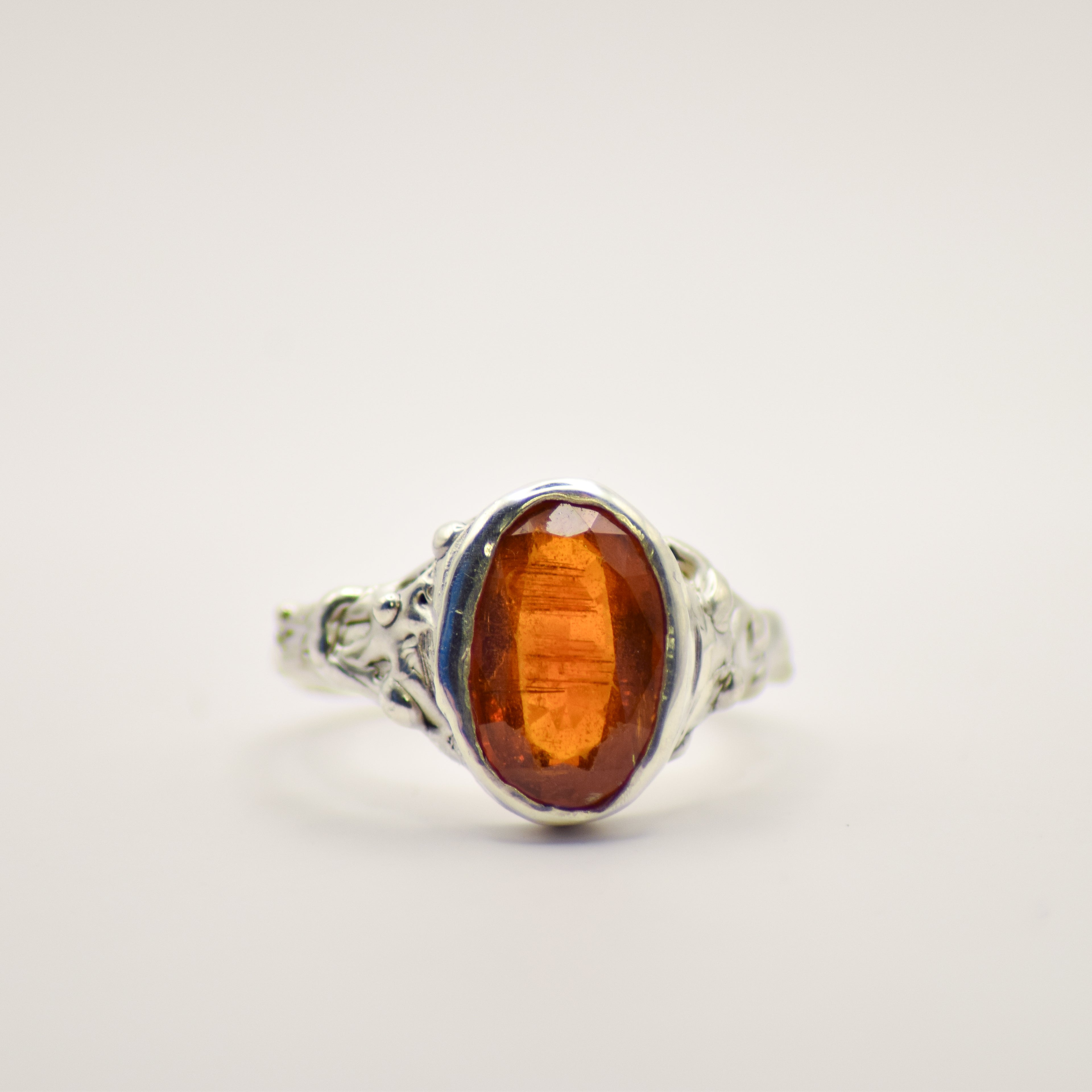 Large orange kyanite ring