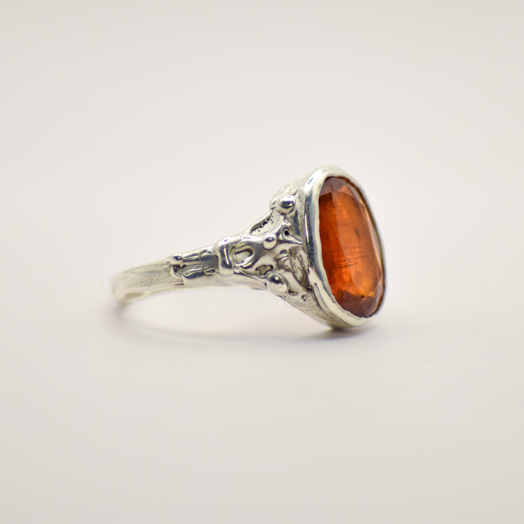 Large orange kyanite ring