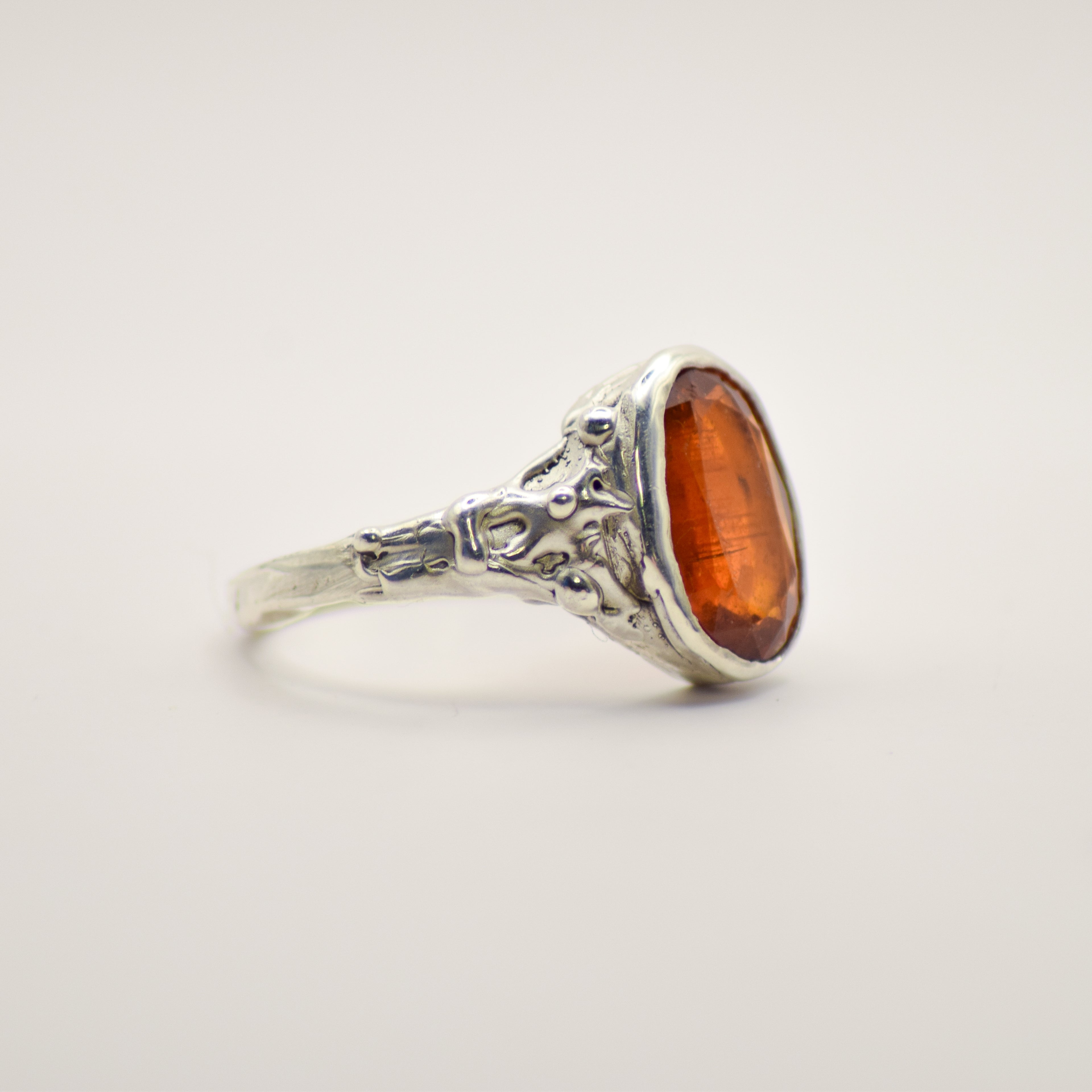 Large orange kyanite ring