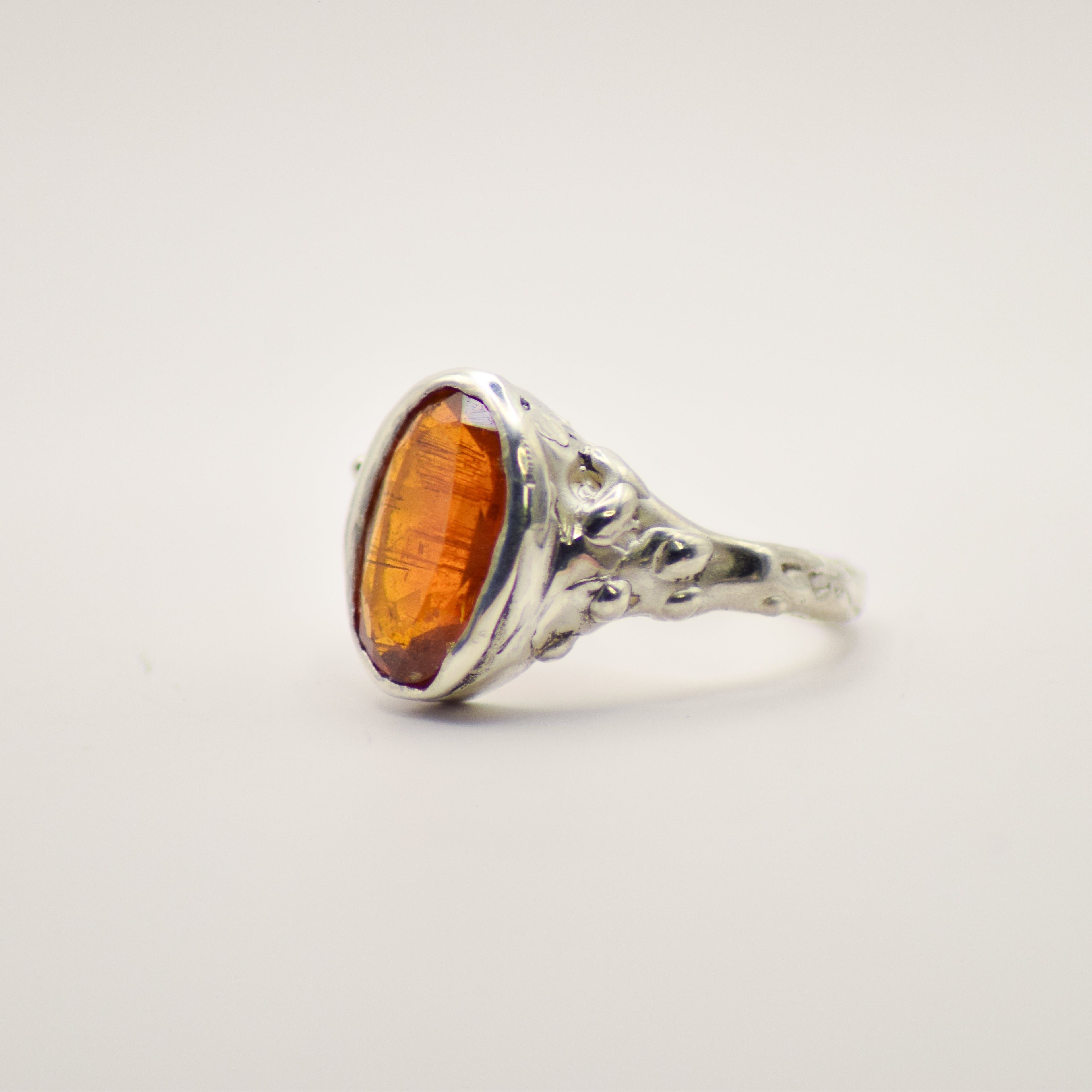 Large orange kyanite ring