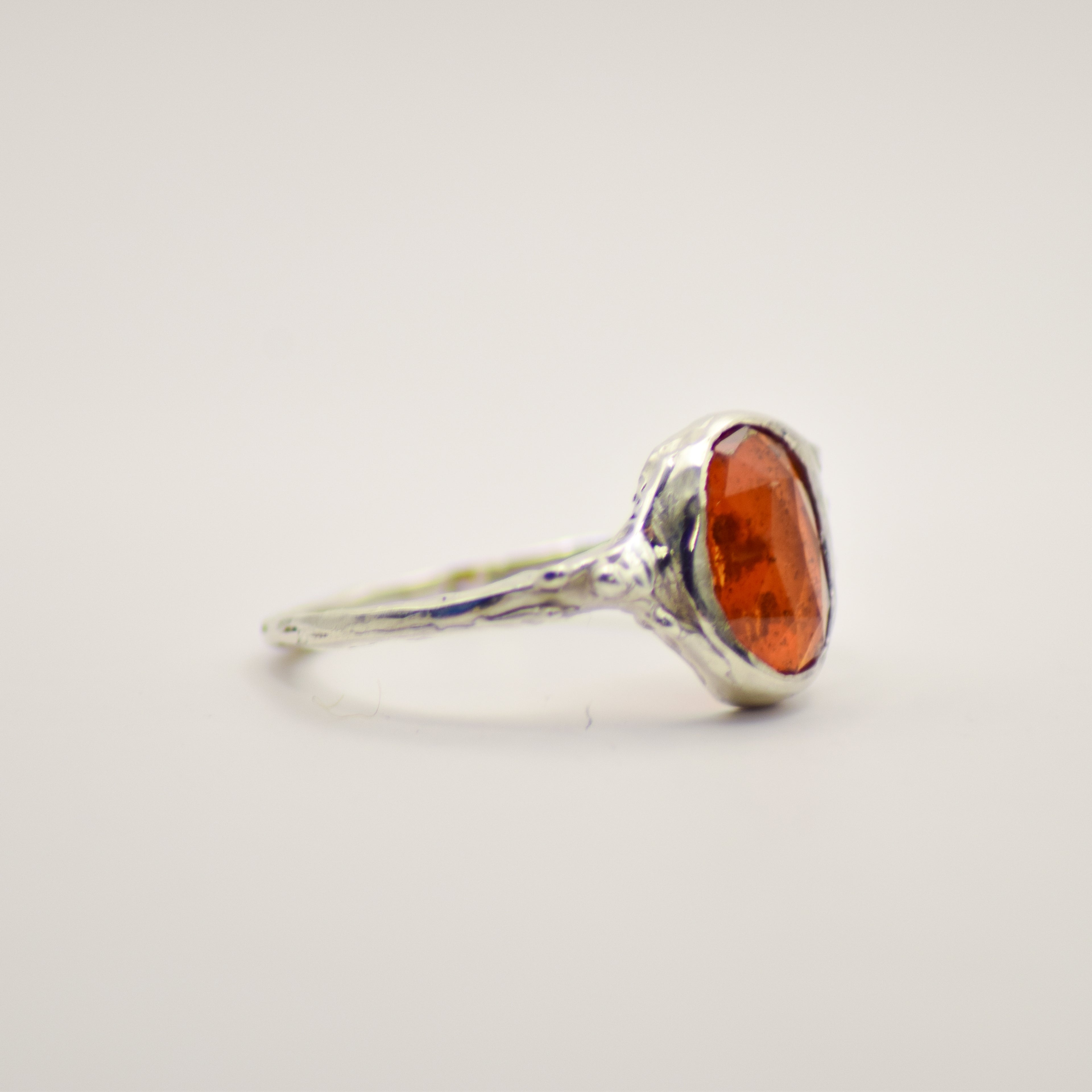 Small orange kyanite ring