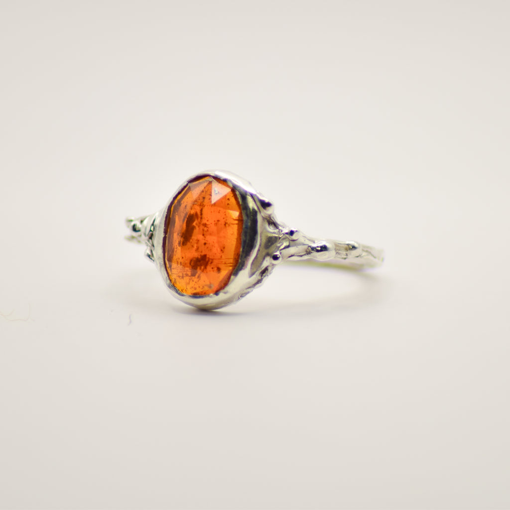 Small orange kyanite ring