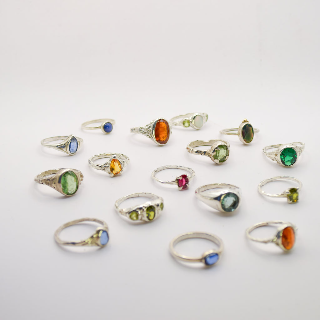 Opal and peridot ring