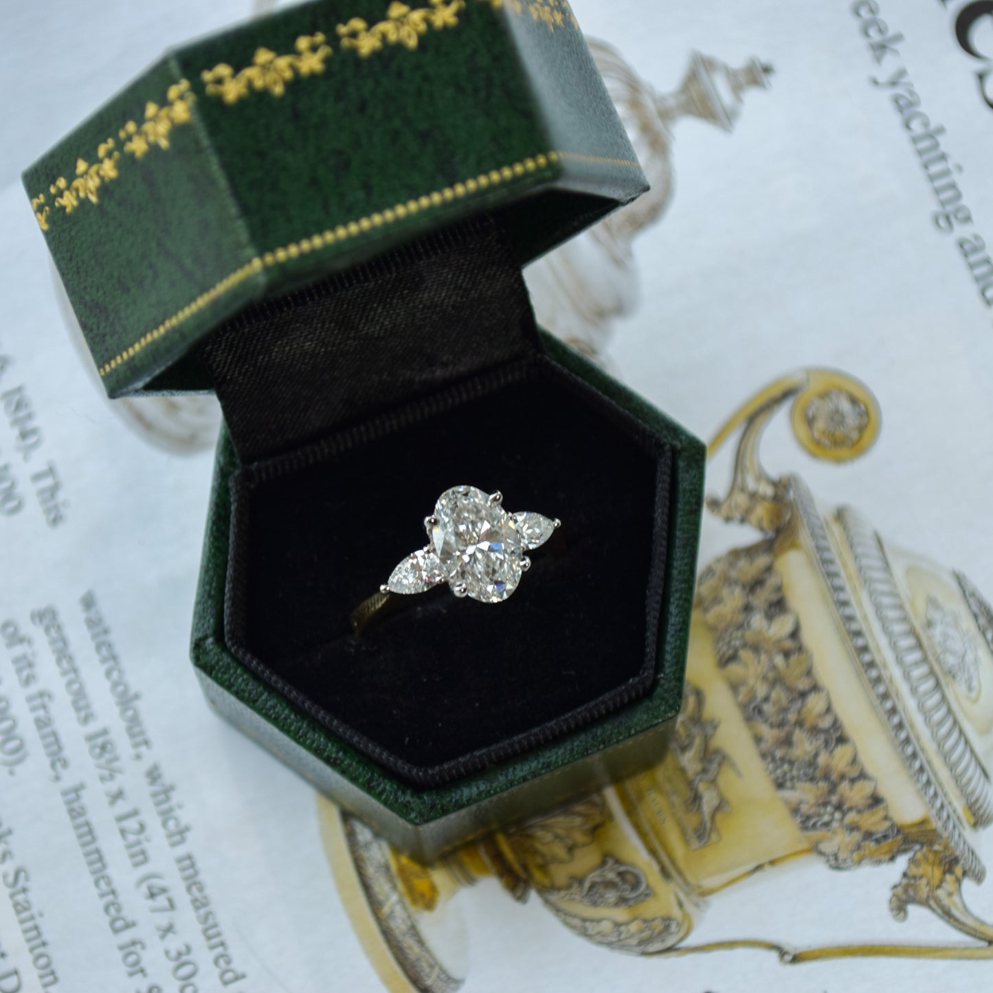 Oval trilogy 18ct white gold ring