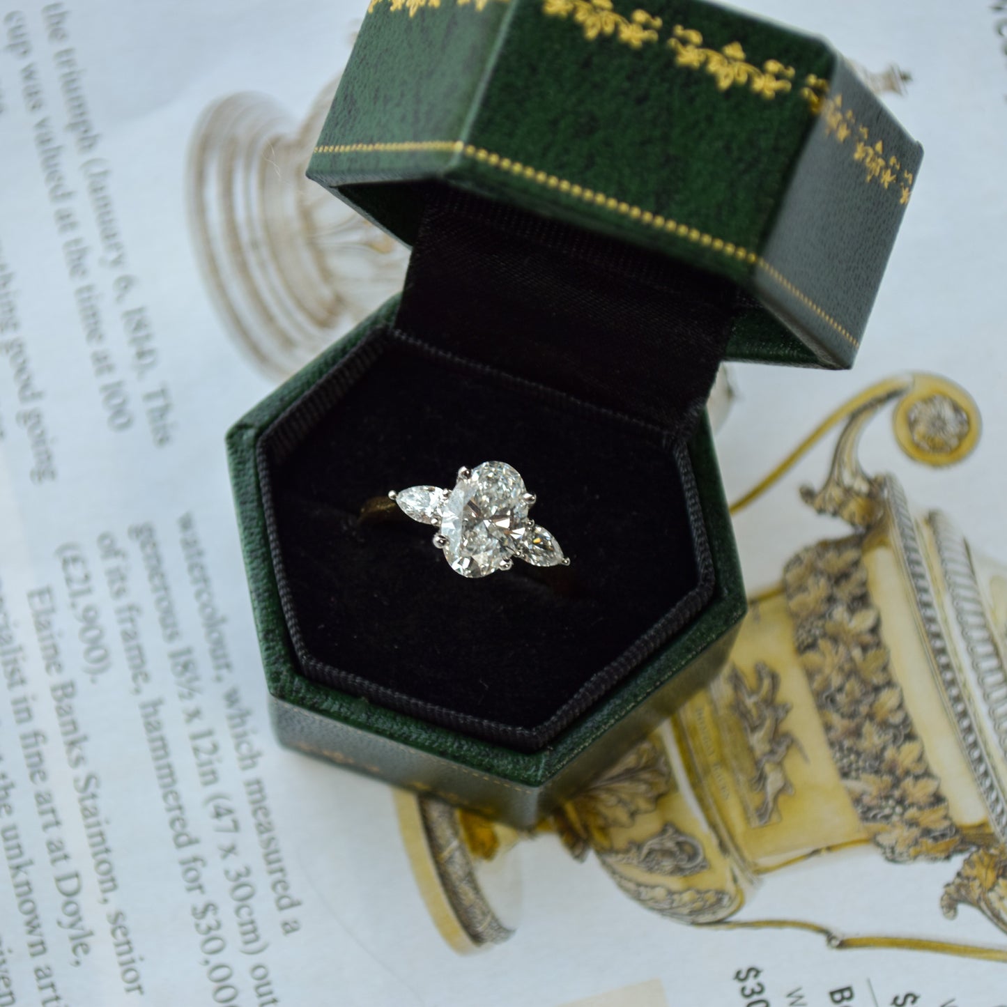 Oval trilogy 18ct white gold ring