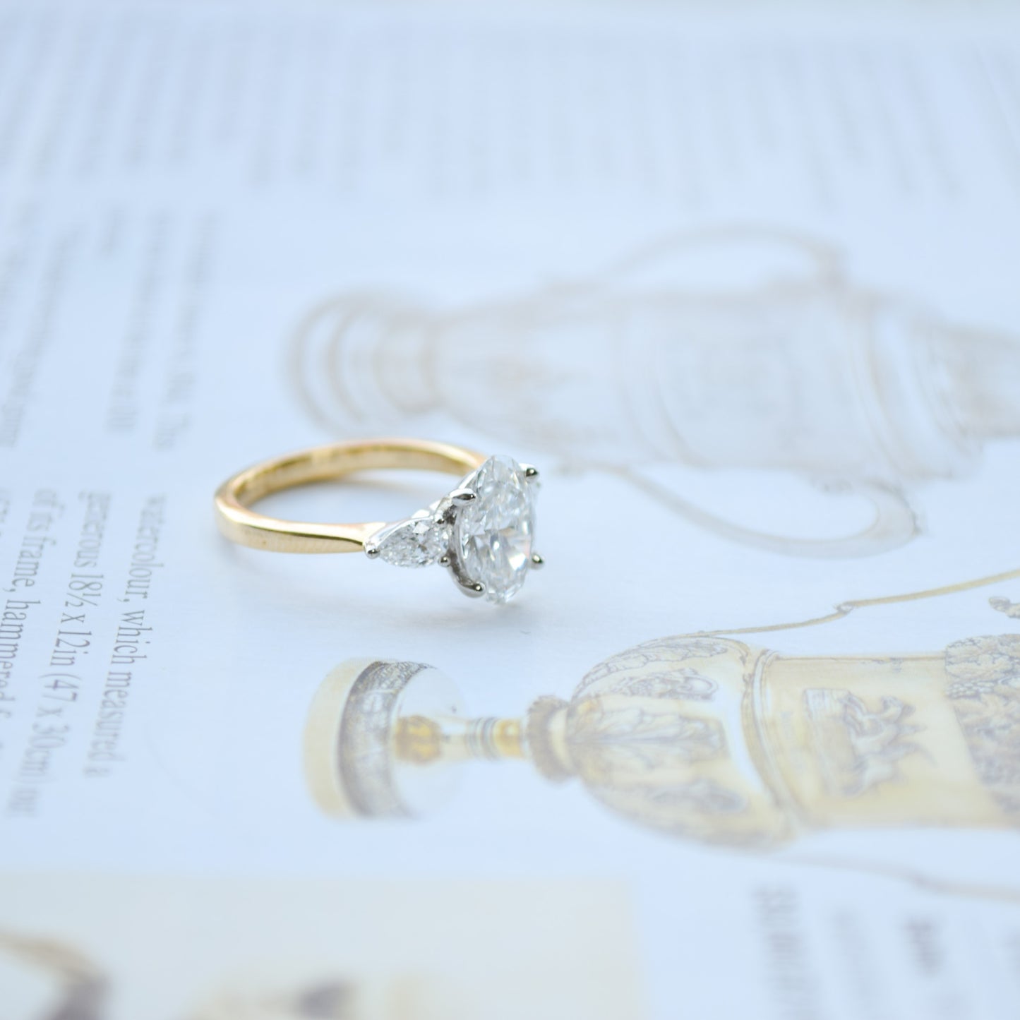 Oval trilogy 18ct white gold ring