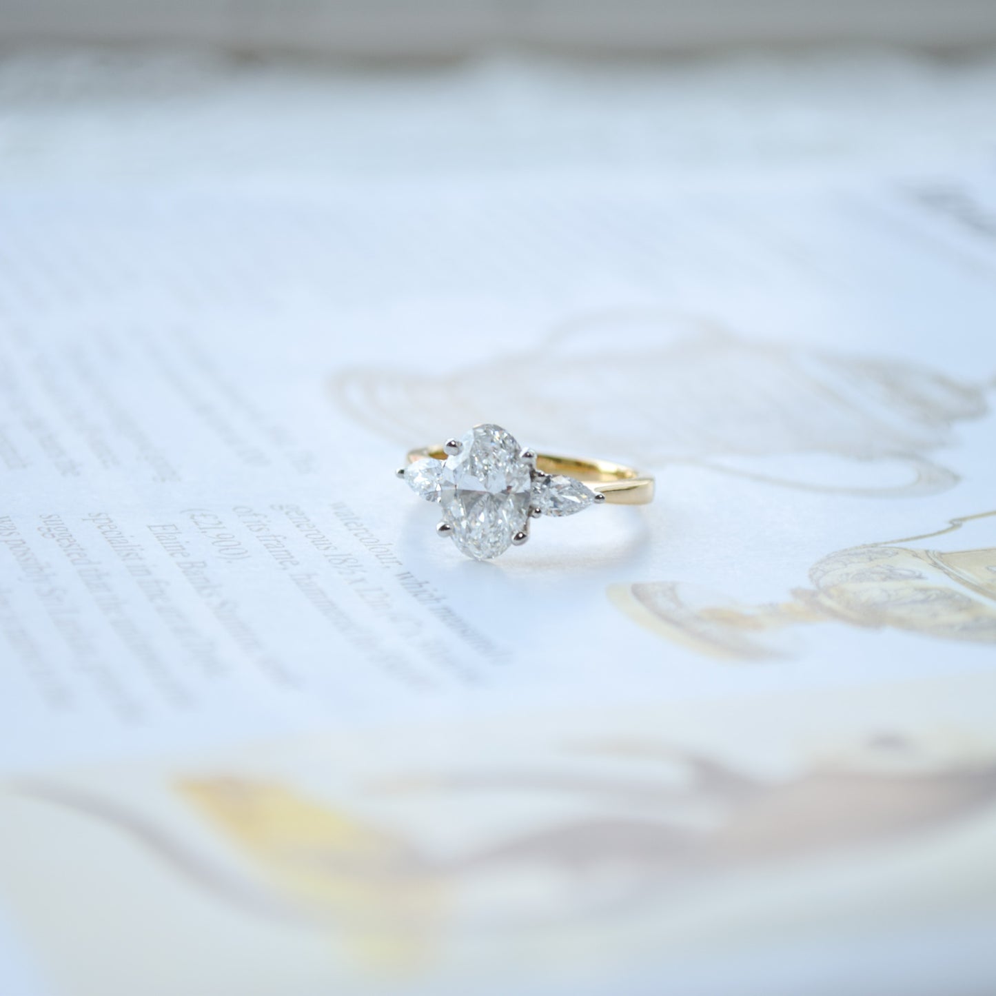 Oval trilogy 18ct white gold ring