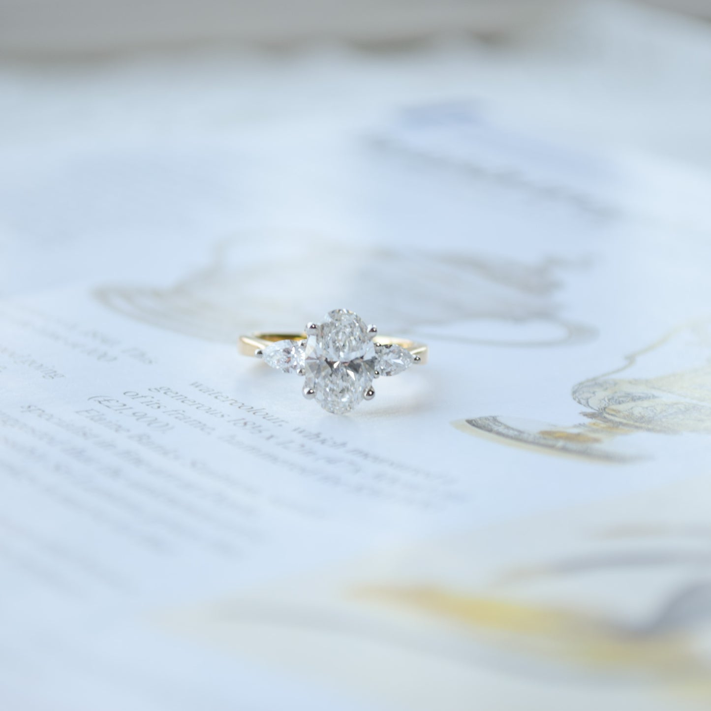 Oval trilogy 18ct white gold ring