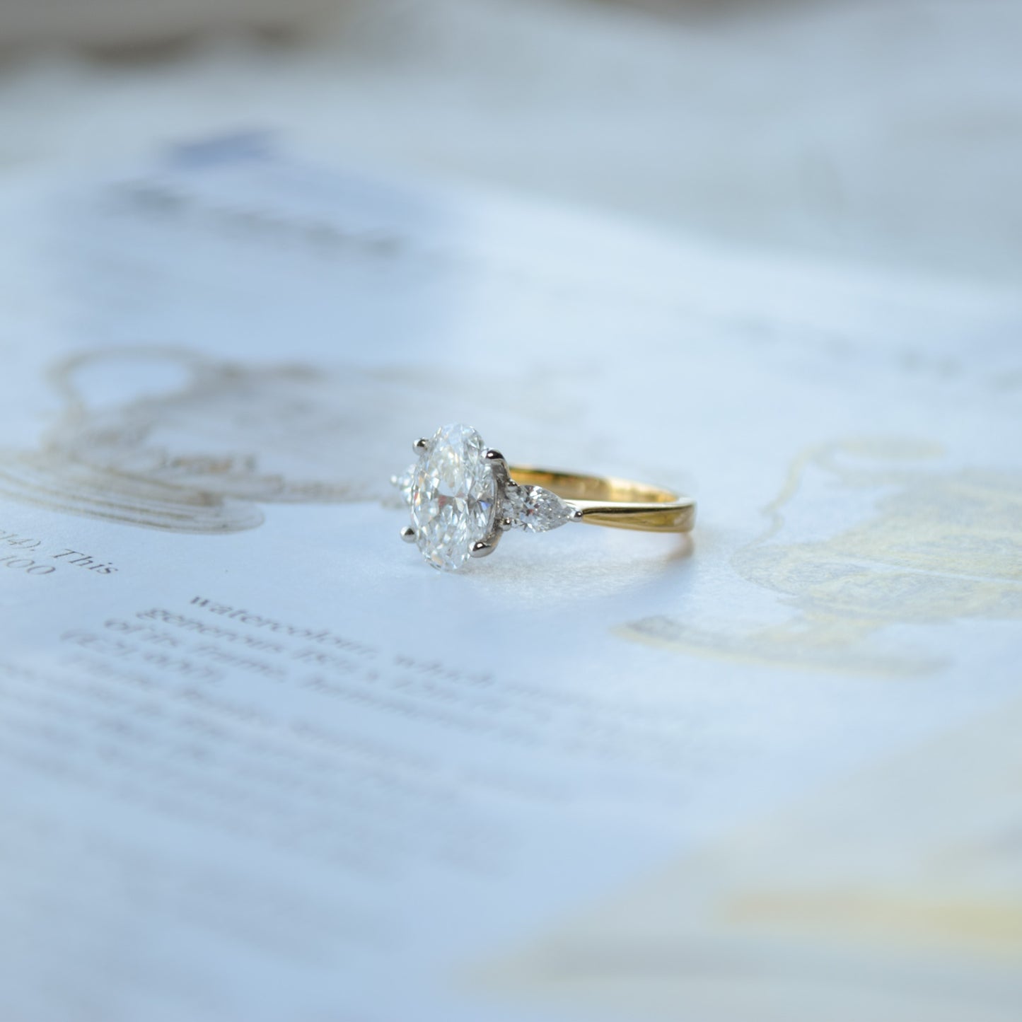 Oval trilogy 18ct white gold ring