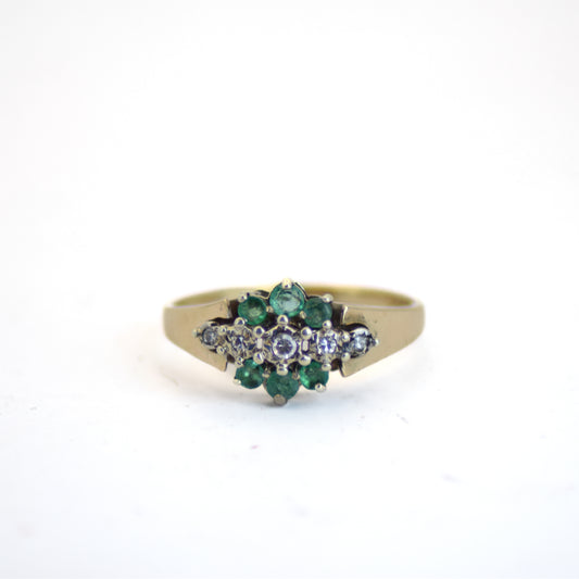 Emerald cluster diamond ring