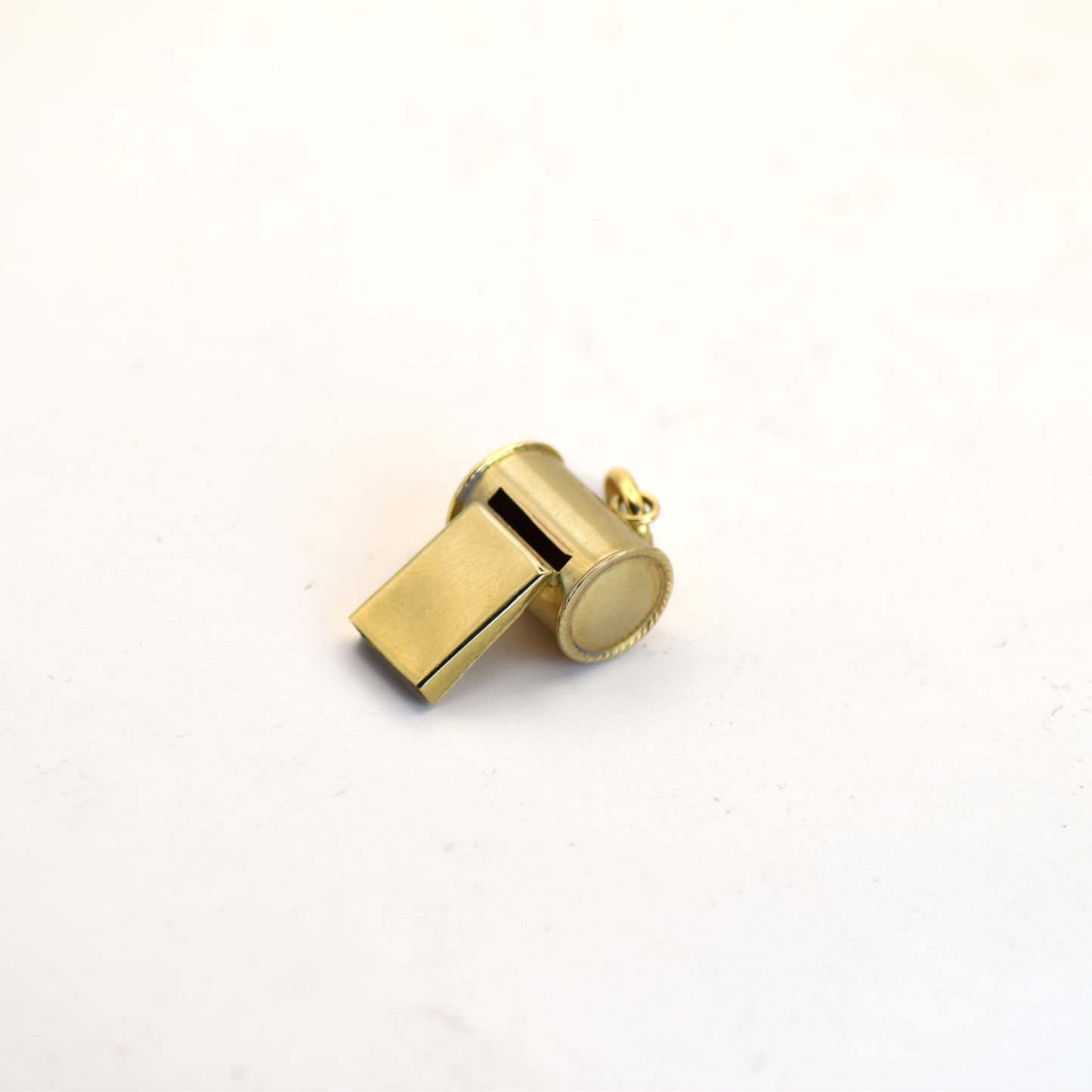 Gold whistle charm