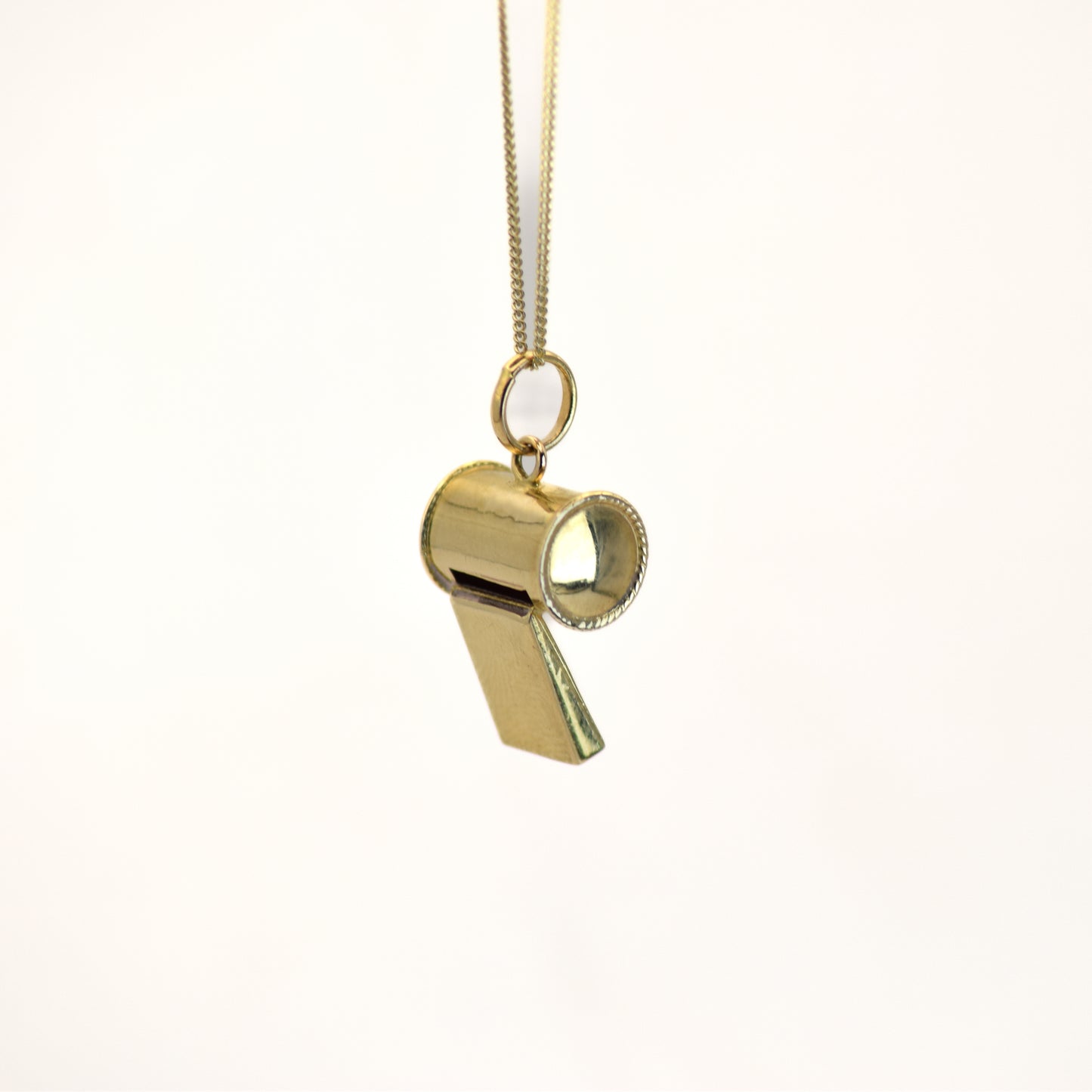 Gold whistle charm