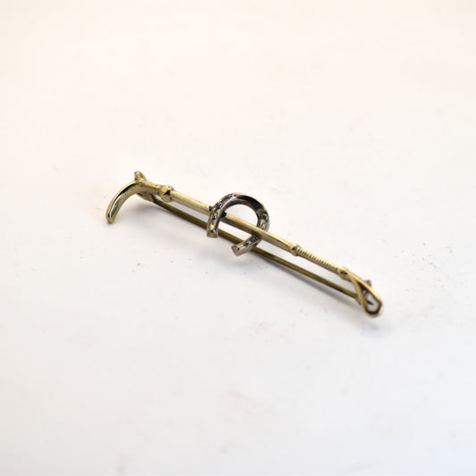 Riding crop brooch